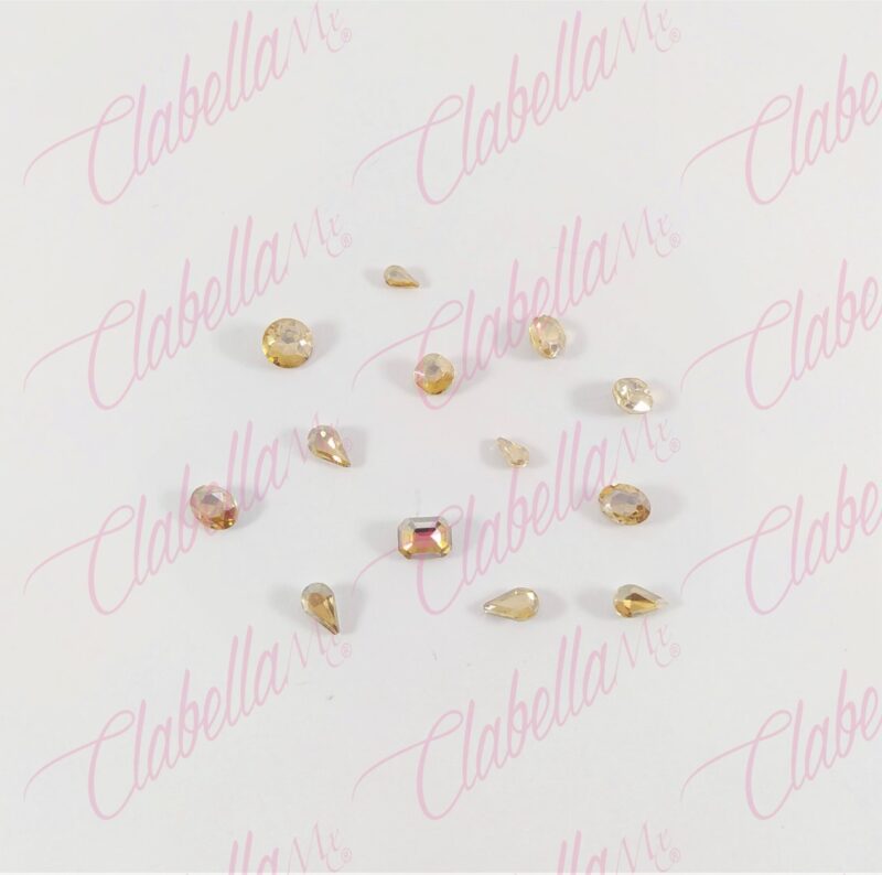 Decoración CRISTAL FIGURAS de plástico CHAMPAGNE para uñas aprox 25 piezas por sobre, surtido MC22-C19