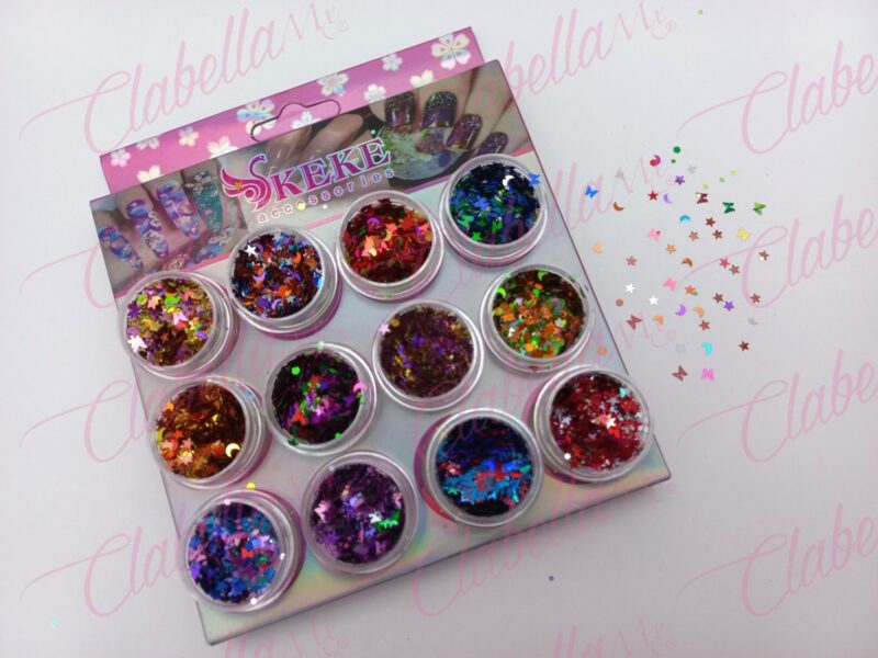 Decoración diferentes FIGURAS MEZCLADAS con estrellas, lunas,mariposas para uñas 12 piezas de 1/8oz  por estuche, (Con estuche) surtido KT(271)-0820 (Figuras mezcladas, NO con glitter, ni crispy)